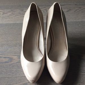 Also nude patent pumps